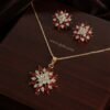 Sana – Gold Red Crystal Layered Starburst Pendant Set Sana – Gold Red Crystal Layered Starburst Pendant Set